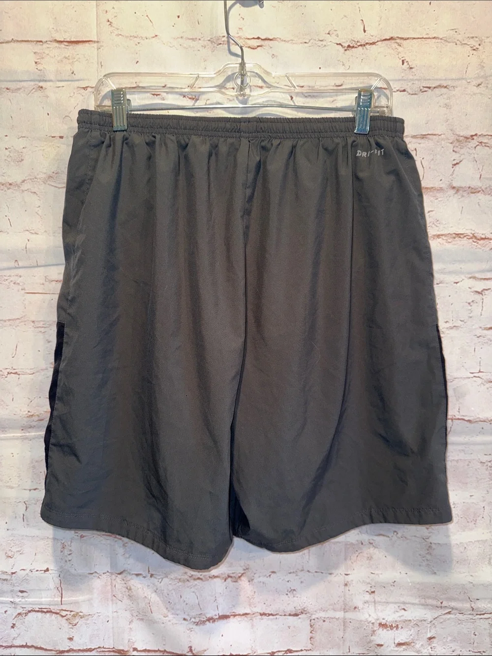 Nike Men's Gray Athletic Shorts Black Side Panels White Swoosh Dri fit pockets